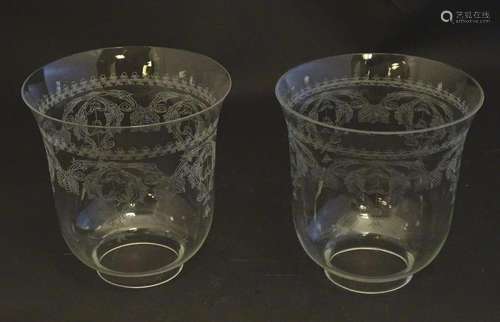 An early to mid 20thC pair of clear glass lamp / light