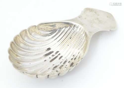 A silver caddy spoon with shell formed bowl, hallmarked