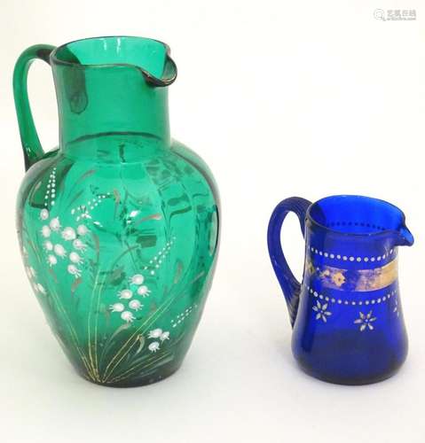 A 19thC green glass jug with overpainted gypsophila