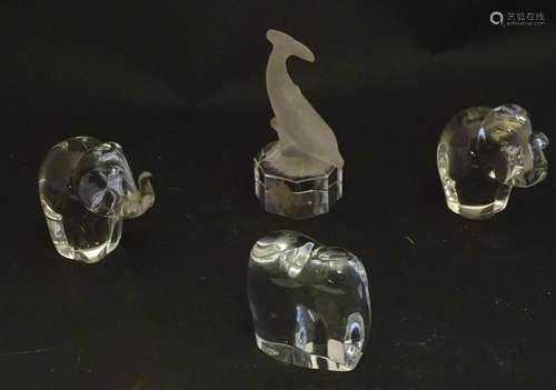 Four figural art glass paperweights, comprising a