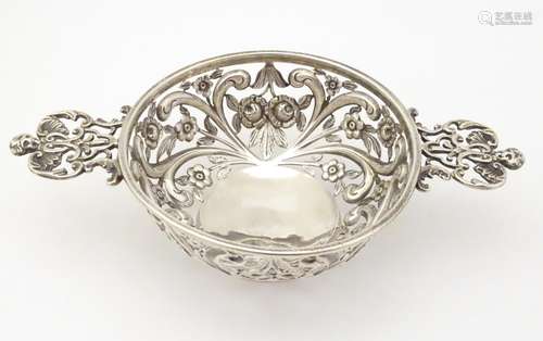 A Victorian silver bonbon dish modelled as a quaich