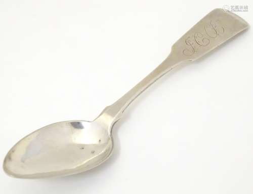 A 19thC silver fiddle pattern teaspoon by Amos Page,