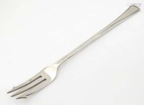 A silver pickle fork, hallmarked Sheffield 1933 with
