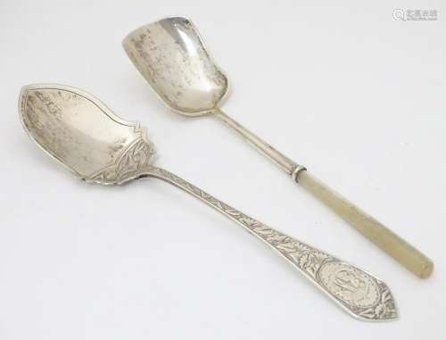 Two silver preserve spoons, one with horn handle