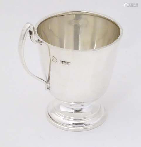 A silver christening mug, hallmarked Sheffield 1970,