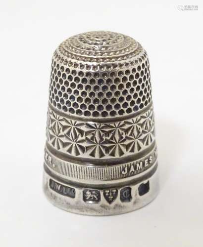 A silver thimble hallmarked Chester 1928 James Walker