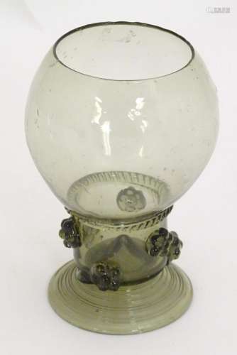 A 19thC Continental Roemer wine glass, the wide stem