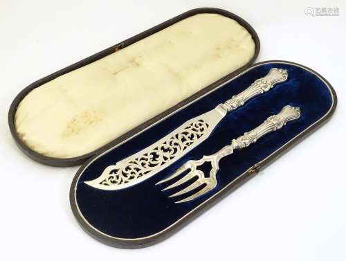 A cased set of fish servers with Victorian silver