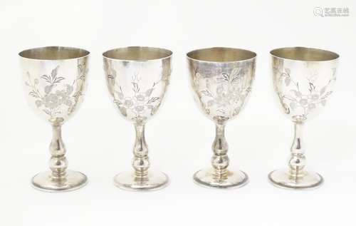 Four Chinese white metal small goblets / egg cups with