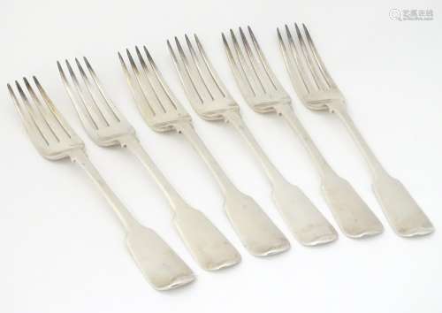 A set of 5 silver fiddle pattern table forks hallmarked