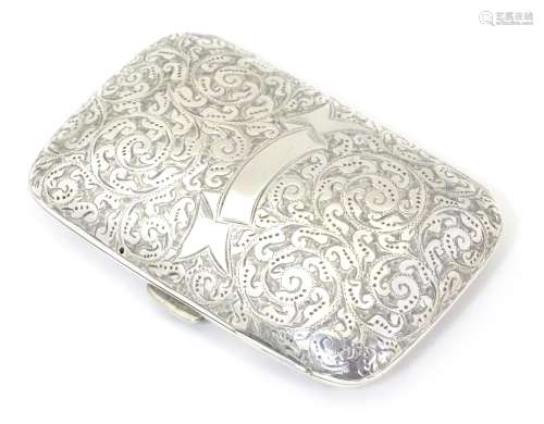 A Victorian silver cigarette case with engraved