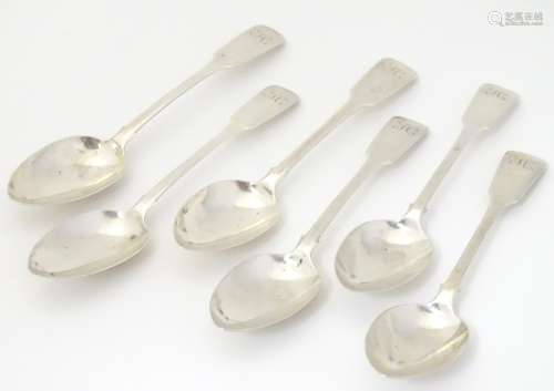 A set of 6 silver fiddle pattern dessert spoons