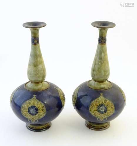 A pair of large Royal Doulton stoneware vases with