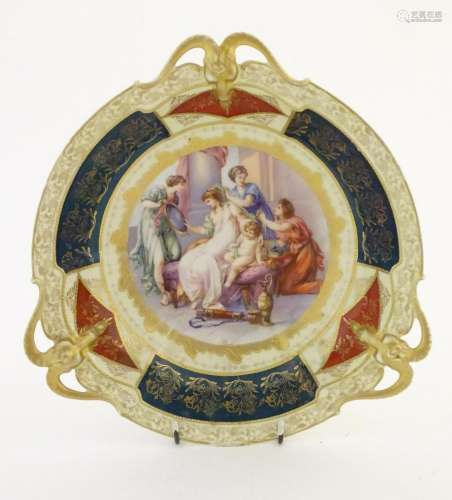 A Continental three handled cabinet plate, the central