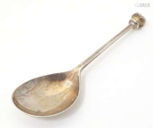 A silver spoon with seal top handle, hallmarked