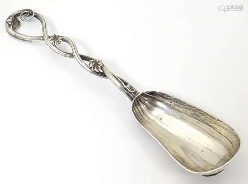 An Elizabeth II silver spoon with shaped bowl formed as