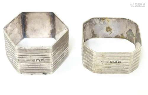 Two Art Deco napkin rings with engine turned