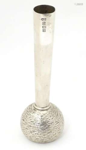 A Elizabeth II silver bud vase with textured base,