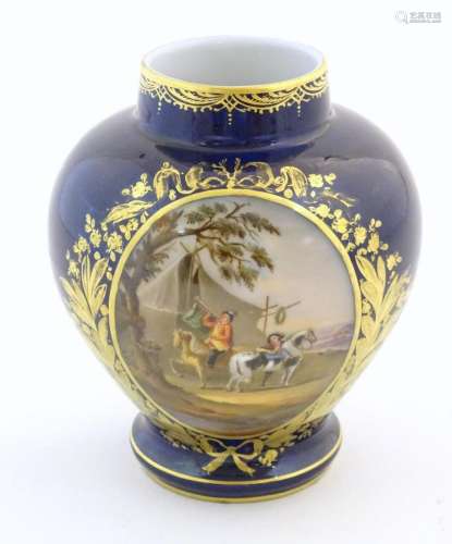 A Continental baluster vase with a hand painted scene