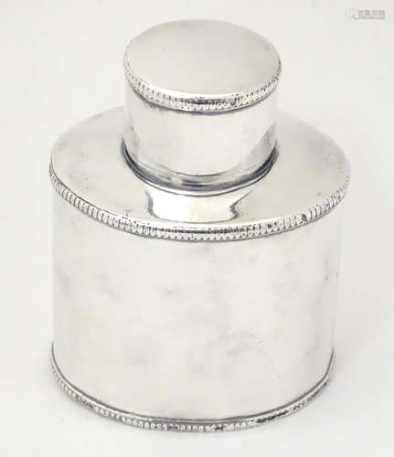 A 19thC white metal tea caddy of ovoid form Approx. 3