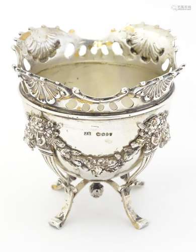 A Victorian silver sugar bowl with swag and garland