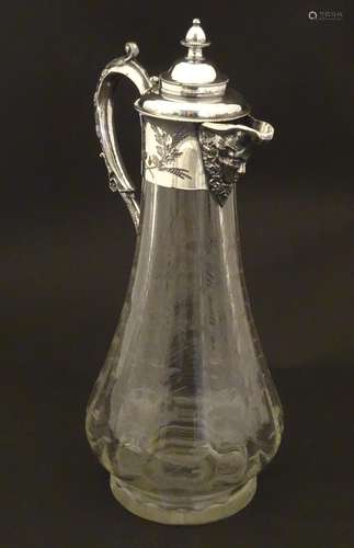 A late 19thC / early 20thC glass claret jug with etched