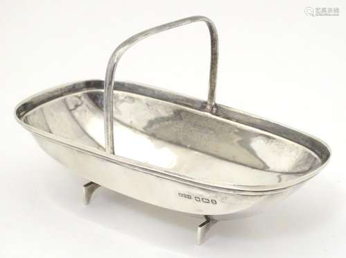 A novelty silver basket / bon bon dish formed as a