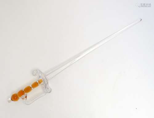 An unusual large clear glass sword with amber glass