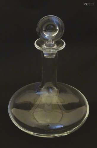 A glass decanter by Baccarat of France. Approx 11
