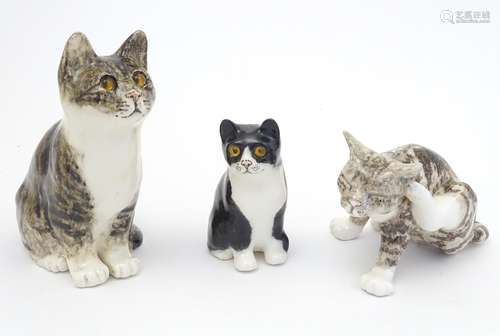 Three Winstanley model of cats, two seated and one