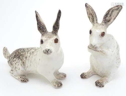 Two Winstanley models of hares, on seated. Signed