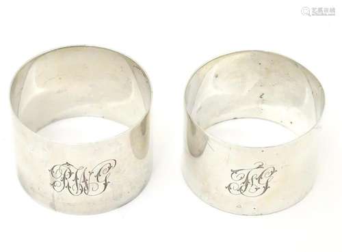 Two silver napkin rings, one hallmarked London 1918,