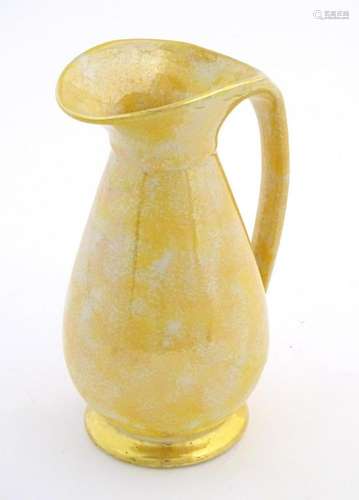 A Govancroft Glasgow pottery jug with yellow spongeware