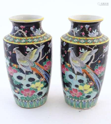 A pair of Oriental vases decorated with stylised