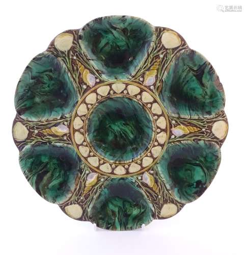 A Victorian Minton majolica oyster plate with relief