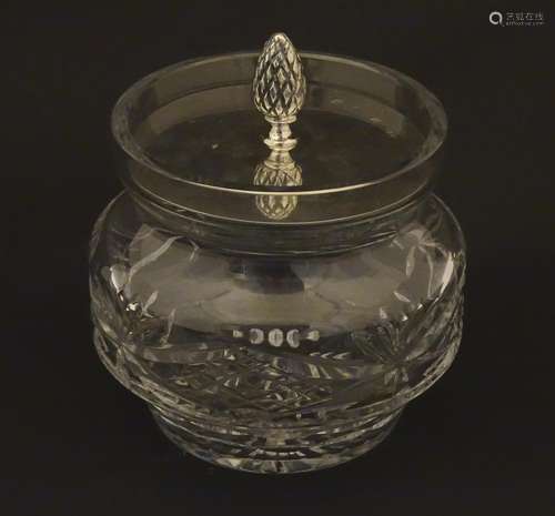 A cut glass / crystal pot with silver lid hallmarked