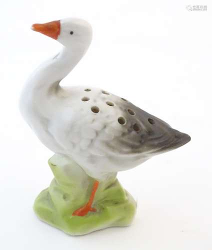 A Continental hat pin holder modelled as a goose.