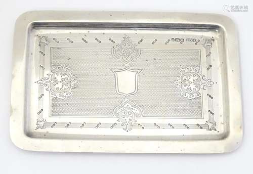 A silver dressing table tray hallmarked Sheffield 1909,