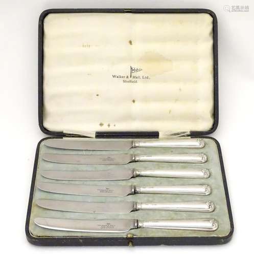 A set of six silver handled tea knives hallmarked