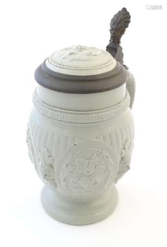 A Villeroy & Boch stoneware stein with moulded foliate