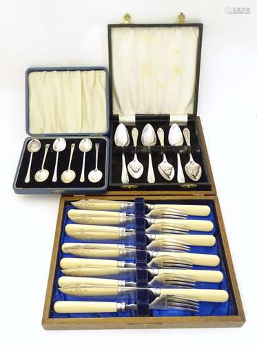 Assorted silver and plated flatware comprising a cased