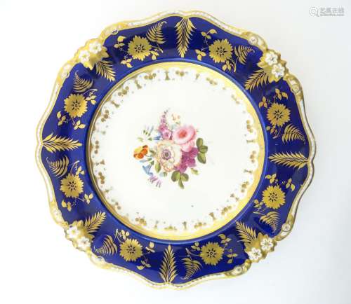 A Bloor Derby plate with floral motif to centre and