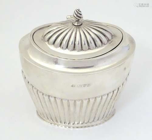 A silver caddy with hinged lid, hallmarked Chester