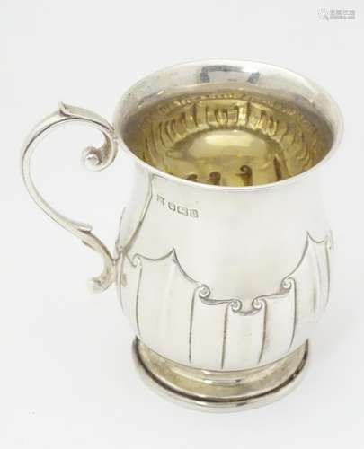 A silver christening mug hallmarked Sheffield 1912,