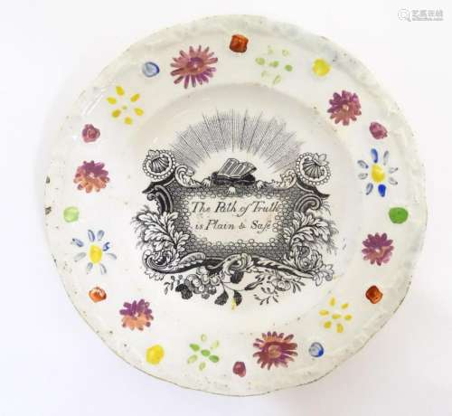 A Victorian nursery plate decorated with a floral