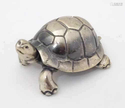 A Continental white metal model of a tortoise. Approx.