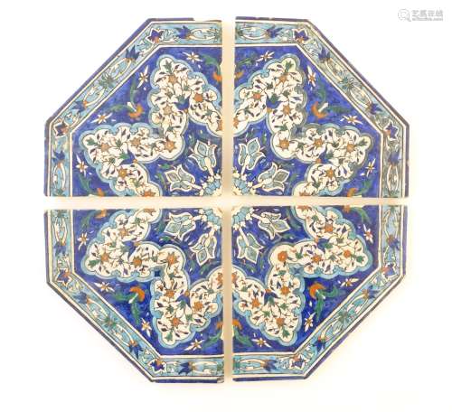 Four Eastern tiles with iznik style floral and foliate