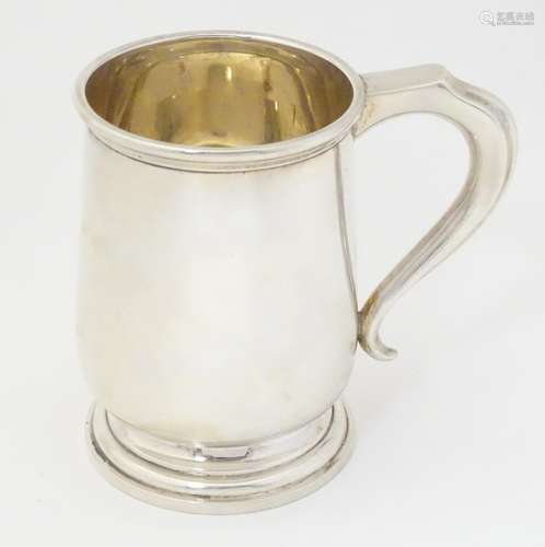 A silver tankard / mug hallmarked Birmingham 1919,