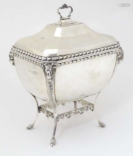 A silver biscuit box in the Adams style, hallmarked