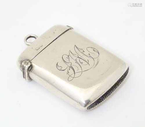 A silver vesta case hallmarked Chester 1903, maker